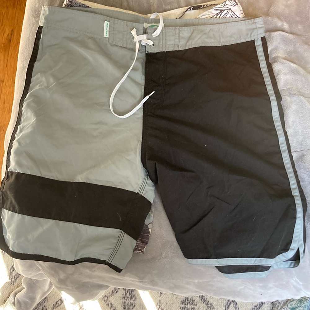 Black and grey board shorts